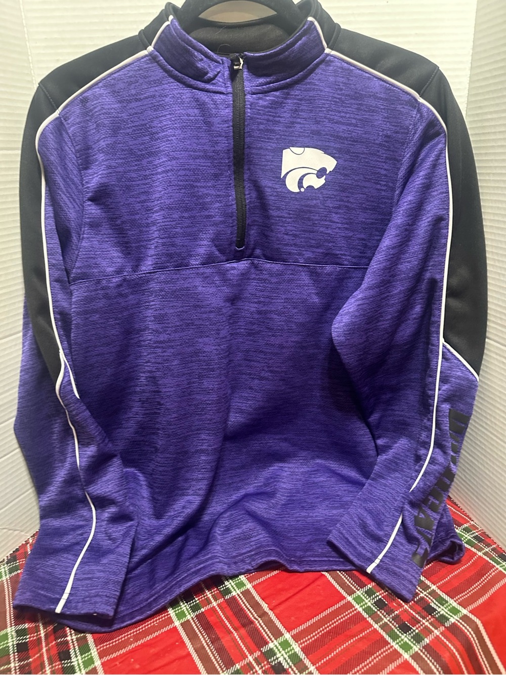 Two K-State Colosseum Youth XL quarter zips.